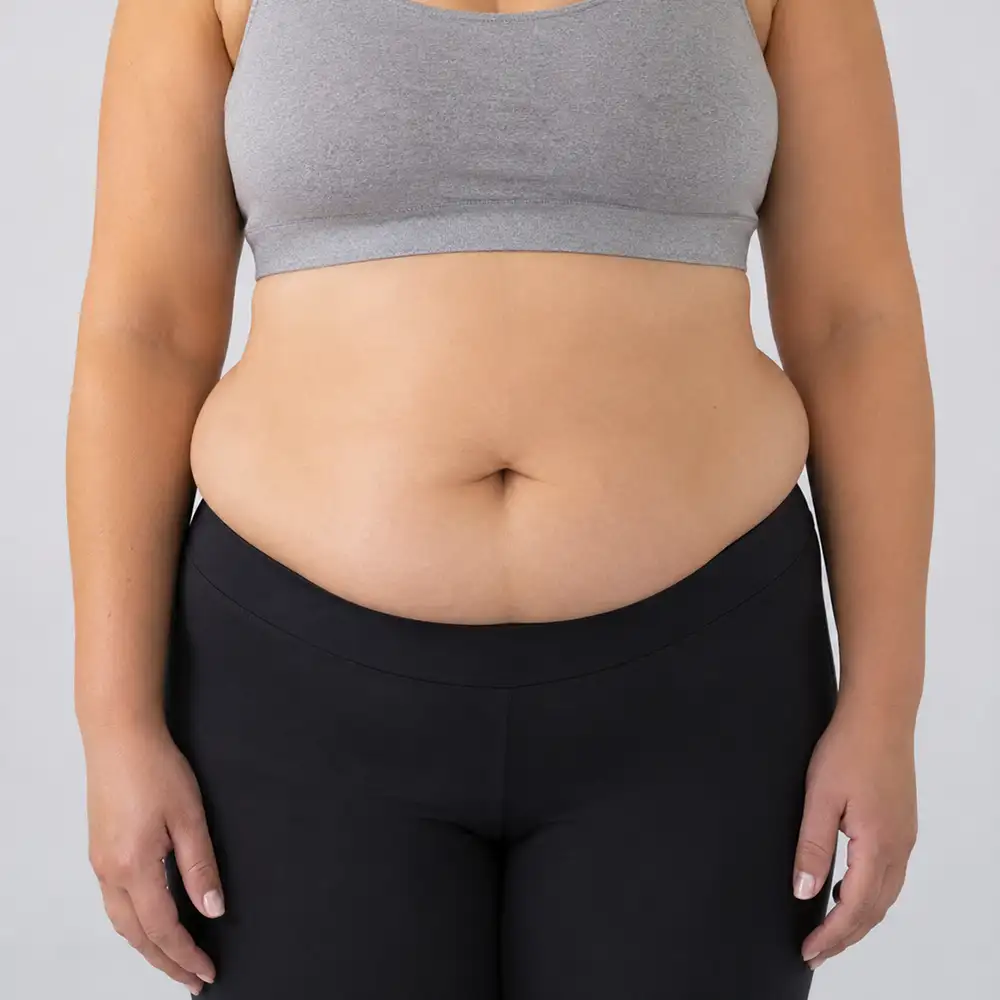 Woman experiencing Weight Gain and Metabolic Changes giving her excess weight